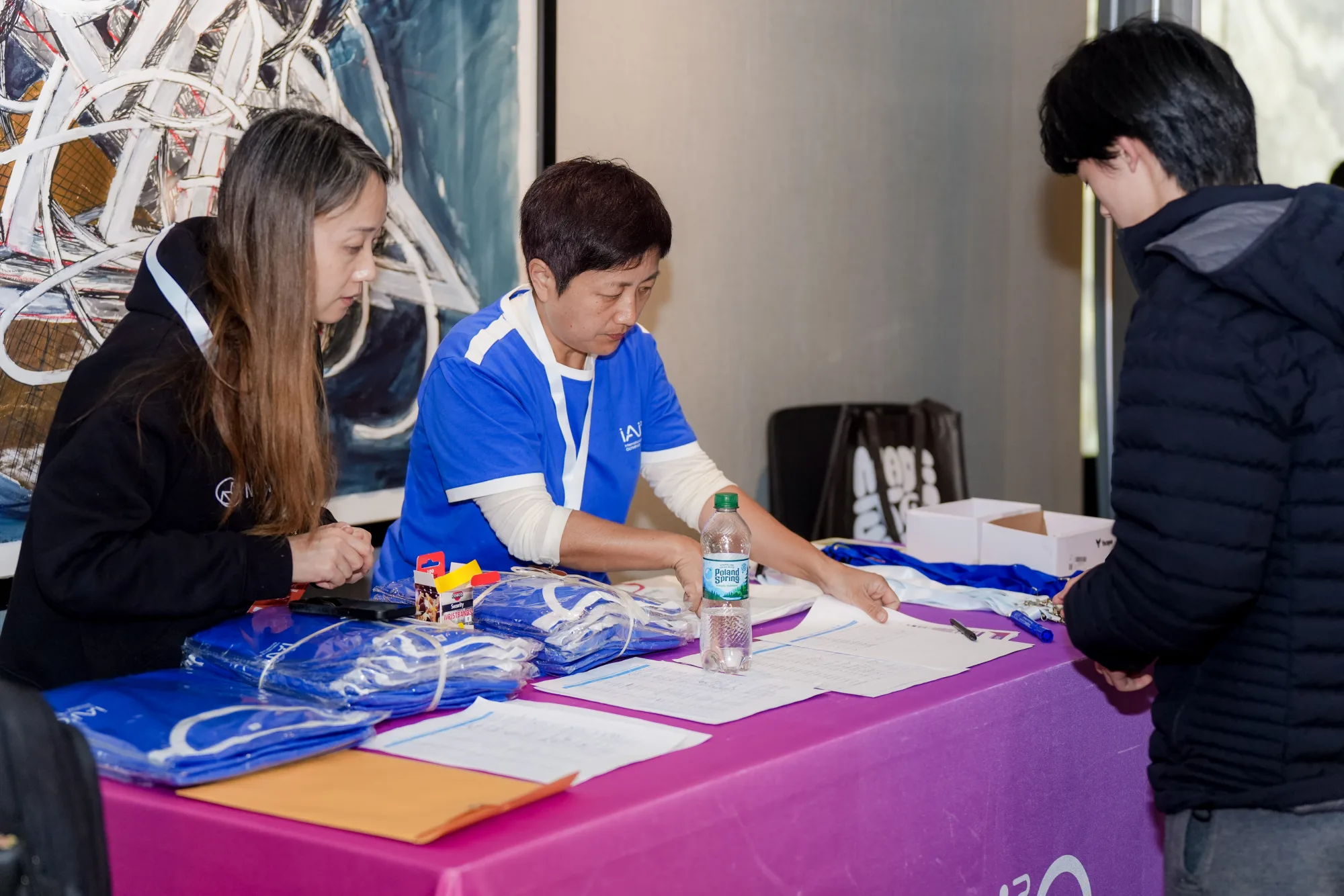 Participants preparing for competition day, photo 1